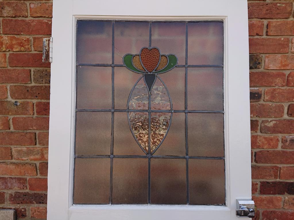 <p>1930s stained glass front door</p><p>32"x 79.5"</p><p><br></p>