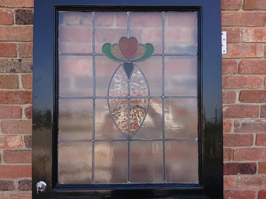 <p>1930s stained glass front door</p><p>32"x 79.5"</p><p><br></p>